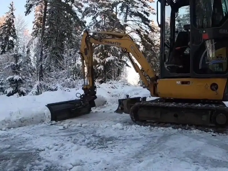 3.Use Snow removal with a mini excavator
